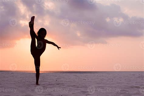 Adorable happy little girl on white beach at sunset. 18047581 Stock Photo at Vecteezy