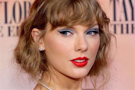 What lipstick brand does Taylor Swift wear to create her signature red lip?