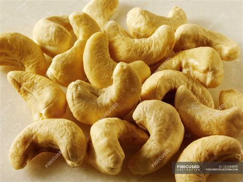 Raw Cashew nuts in heap — Healthy Eating, unprocessed - Stock Photo ...