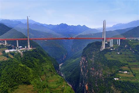 China drives ever upwards with world's highest bridge