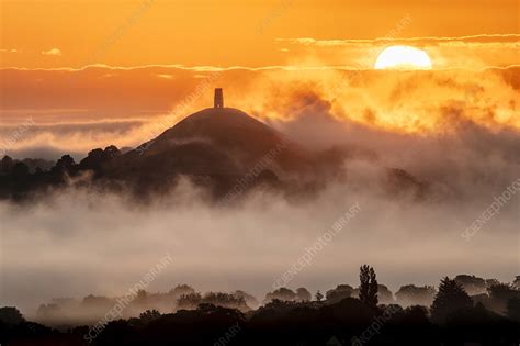 Glastonbury Tor at sunrise, Somerset, UK - Stock Image - C051/9550 - Science Photo Library