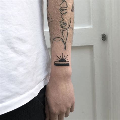 Rising sun tattoo by Rich Sinner - Tattoogrid.net