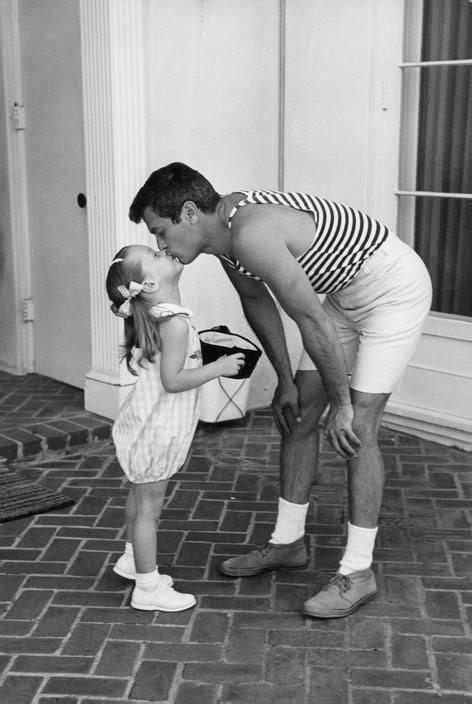 Tony Curtis at his home in Berverly Hills, with his daughter Jamie Lee Curtis. 1960. Photo ...