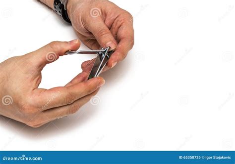 Male clipping nails stock image. Image of equipment, male - 65358725