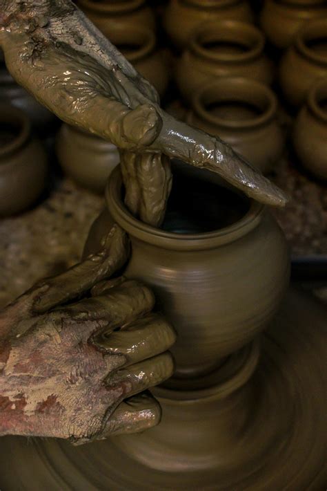 Person Molding Brown Clay Pot · Free Stock Photo