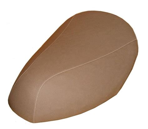 a close up of a brown leather seat on a white background