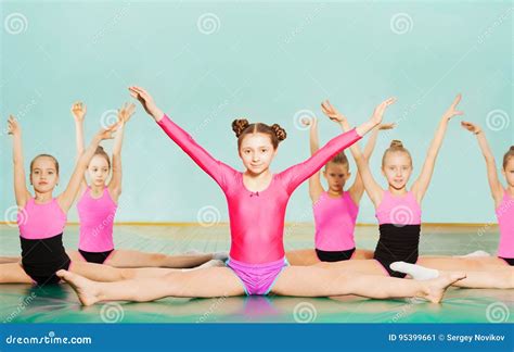 Girls Performing Splits during Gymnastics Class Stock Image - Image of copyspace, preteen: 95399661