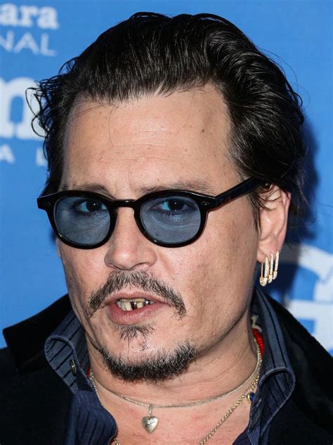 Former Sex Symbol Johnny Depp Spotted With Yellow Teeth