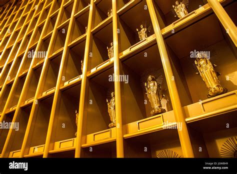 Golden standing statues of Buddha inside Ushiku Daibutsu, Ibaraki prefecture, Japan Stock Photo ...