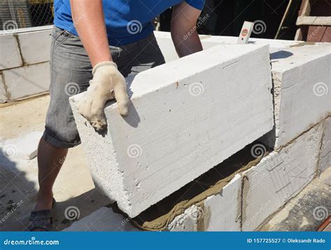 Laying Autoclaved Aerated Concrete Blocks For House Wall. Close Up On ...