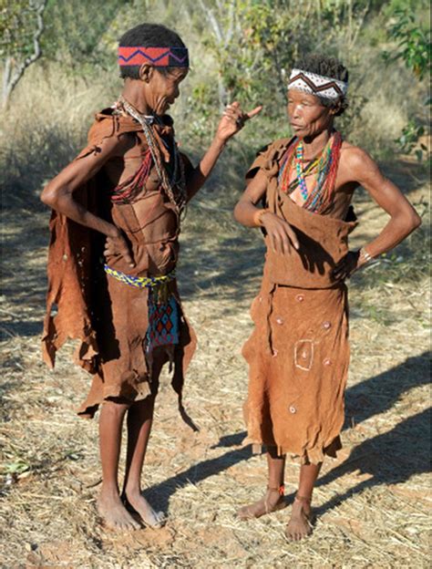 Africa | Two San women deep in conversation. Xai Xai Hills, Botswana | ©Nigel Pavitt | The San ...