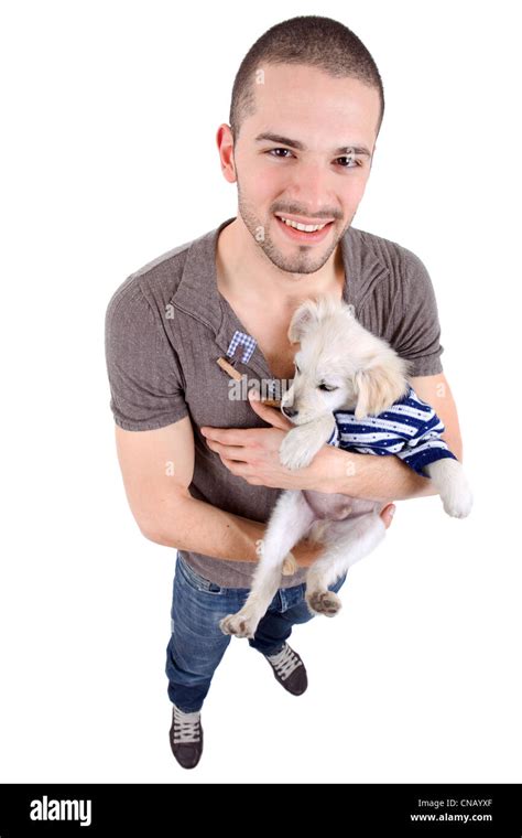 young casual man full body with a small dog Stock Photo - Alamy