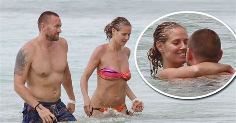 Heidi Klum frolics in the sea with her bodyguard boyfriend to show ...