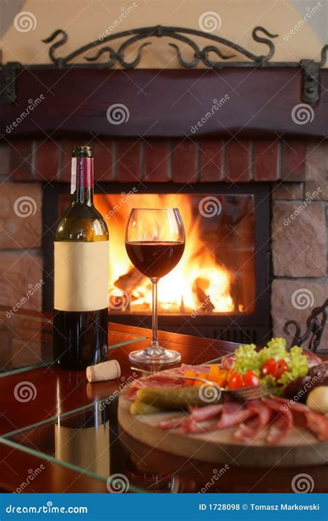 Fireplace And Red Wine 2 Royalty Free Stock Photos - Image: 1728098