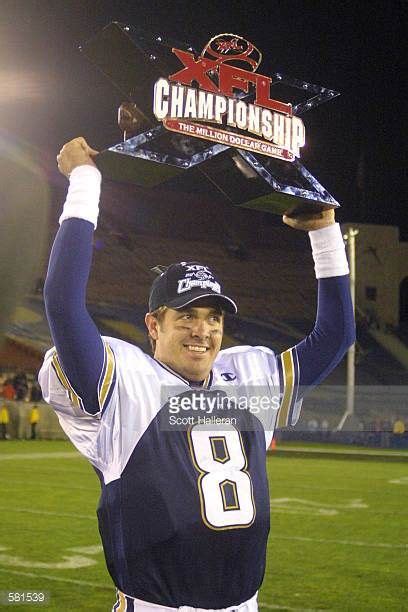 Tommy Maddox of the Los Angeles Xtreme celebrates with the XFL Championship trophy after ...