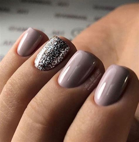 Beautiful manicure with a purple-based mauve-gray color, and a sparkly ...