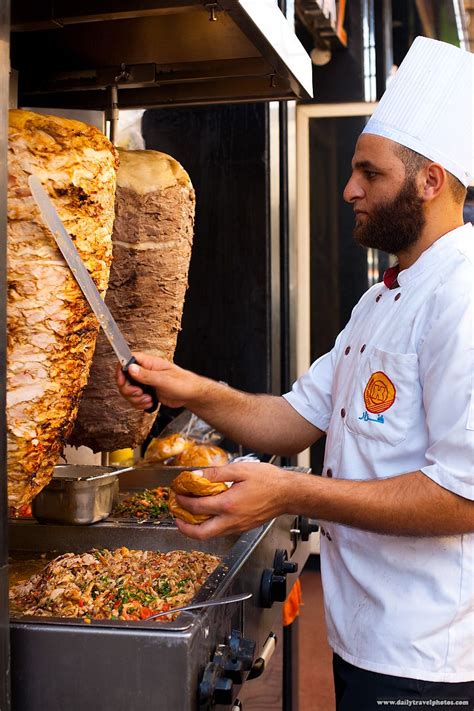 Shaved Meats - Chicken and lamb shawerma meats rotate on a skewer ...