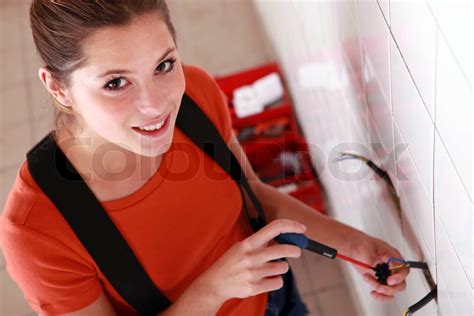 A female electrician at work | Stock image | Colourbox