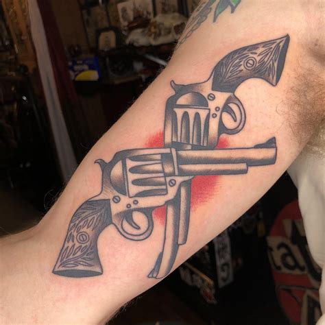 Crossed pistols by Tyler Adams, Grizzly Tattoo in Portland, OR : r/tattoos