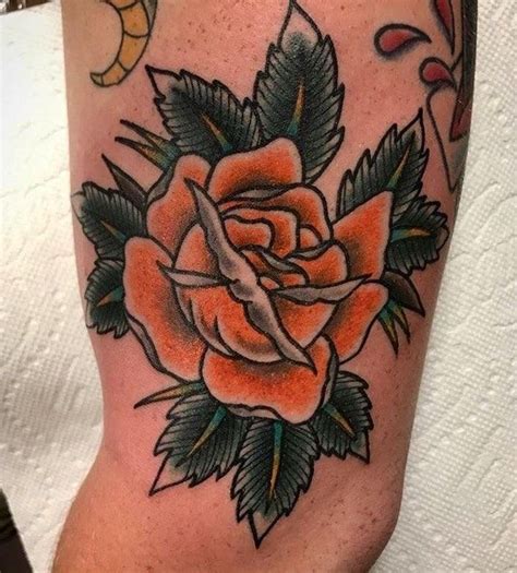 Orange rose by Logan shermeyer at folk city tattoo, va beach VA