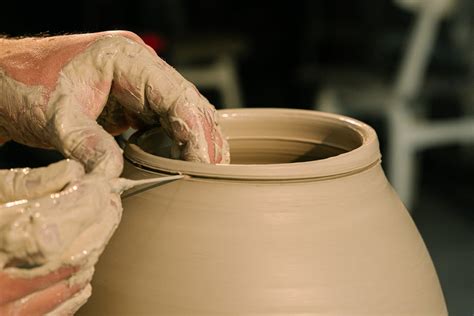 Person Holding White Clay Pot · Free Stock Photo