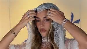 Here comes the naked bride! Sydney socialite stuns in 'nude' lace mini