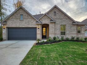 15552 Leopard Lily Lane , Conroe, TX 77302.