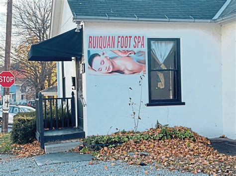 Probation imposed on massage parlor worker charged in prostitution ring