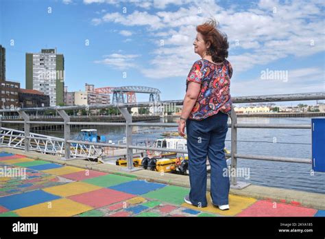 Mature latin woman enjoying a sunny summer day at the tourist