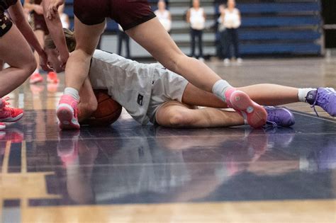 Toughness powers Saline girls hoops to top of SEC-Red