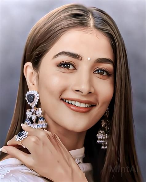 a woman with long hair wearing earrings and smiling