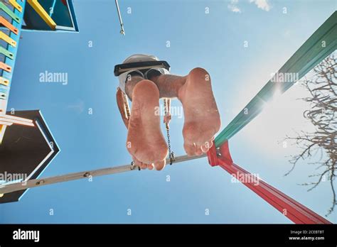 park playground swinging barefoot  res stock photography  images