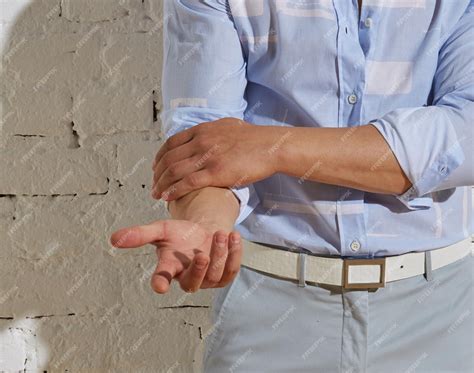 premium photo  young man   arm injury