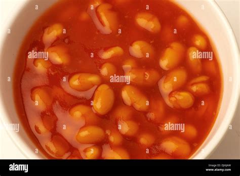 Baked beans in a bowl Stock Photo - Alamy