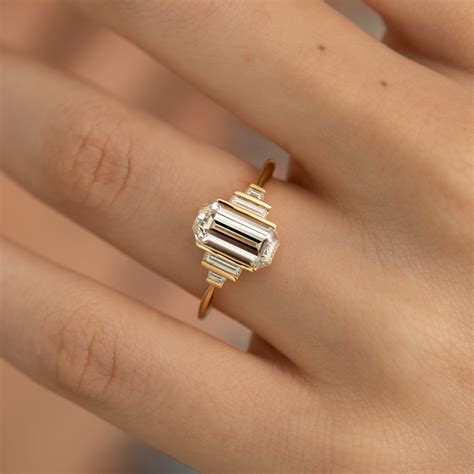 gold emerald cut engagement ring 8