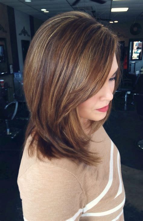 Stylists are raving about dark hair with colour for low light 4