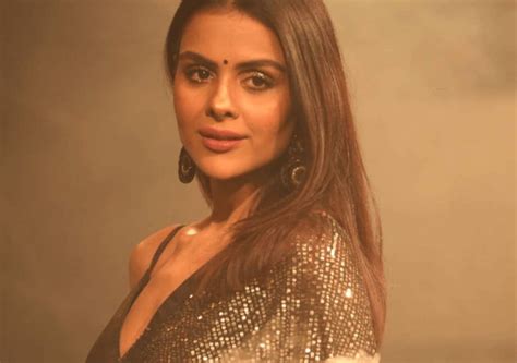 bigg boss  priyanka chahar choudhary poses   blanket