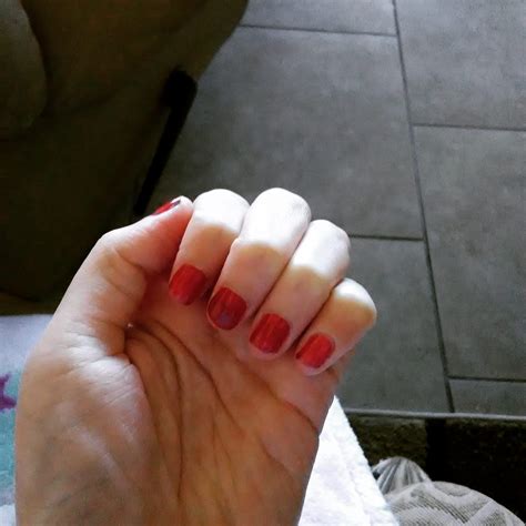 I painted my nails red but, I'm not sure if I should add sparkles/green