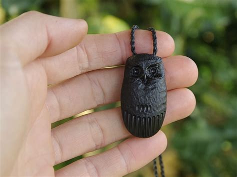 beach ruru morepork  carved piece