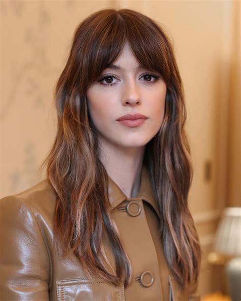 Short hairstyles with fringe and layers are the season's boldest look 8