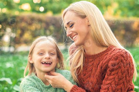 happy mother  daughter   park  stock photo  vecteezy