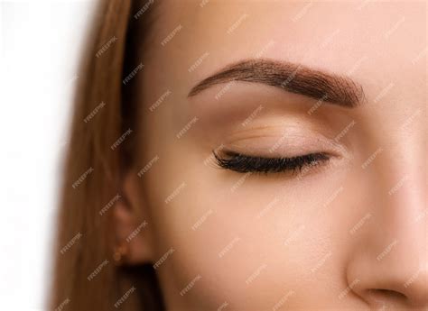Premium Photo | Permanent make up on eyebrows.
