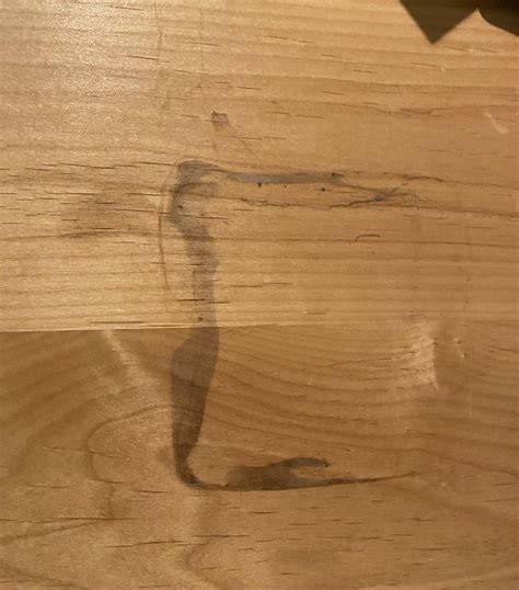 Any way to fix this water damage ? Just noticed it under a pot, it’s