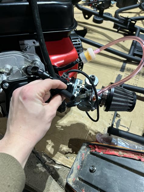 Where do I connect the breather tube? First time building a mini bike