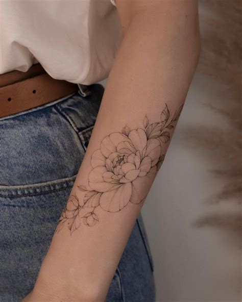 Floral wrist tattoo flower wrist tattoo wrist tattoo designs feminine ...