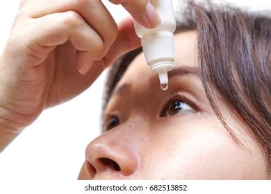 Woman Dripping Eye Eyes Drops Close Stock Photo 682513852 | Shutterstock