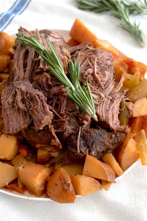 Easy & Tender Slow Cooker Pot Roast - Laughing Spatula
