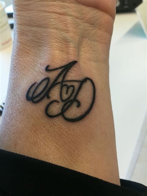 Letter D With Heart Tattoo Designs
