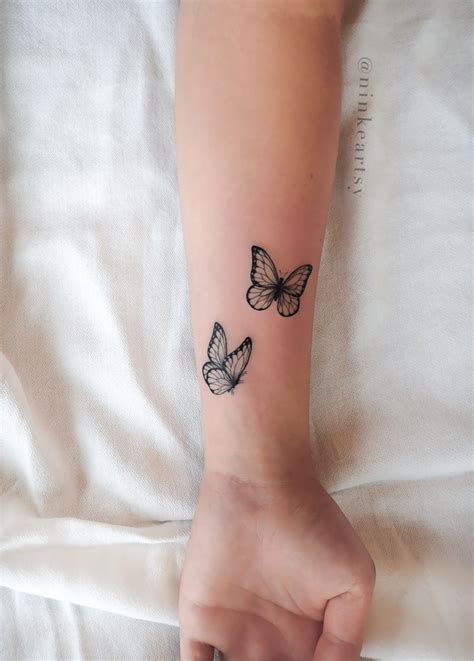 small butterflies tattoo 1