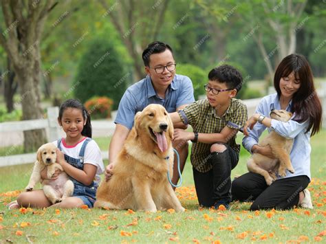 Premium Photo | Asian family with dog in park
